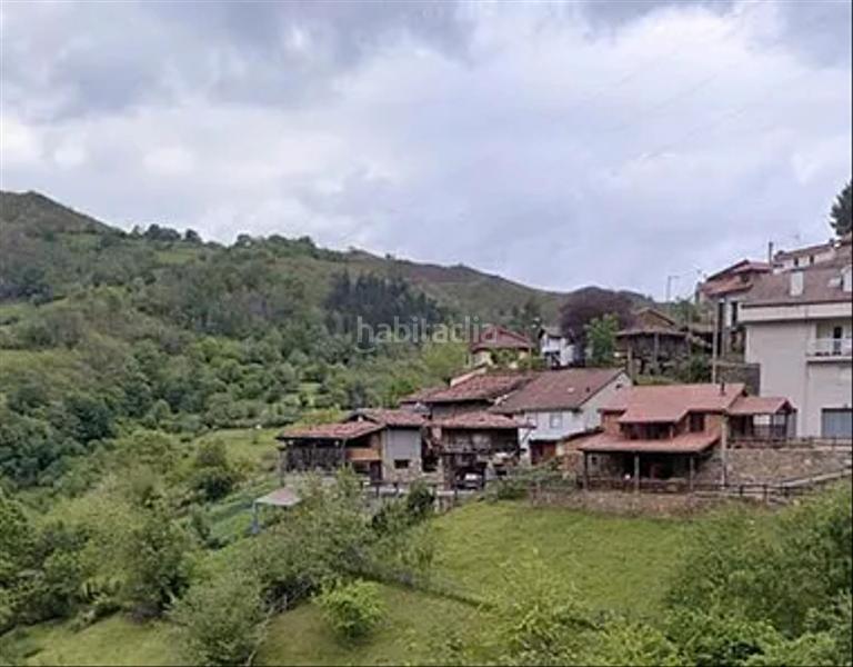 Foto 5cd6b1a5-deeb-4fc9-b2ad-b7e54416086e. Reihenhaus mit kamin in Laviana