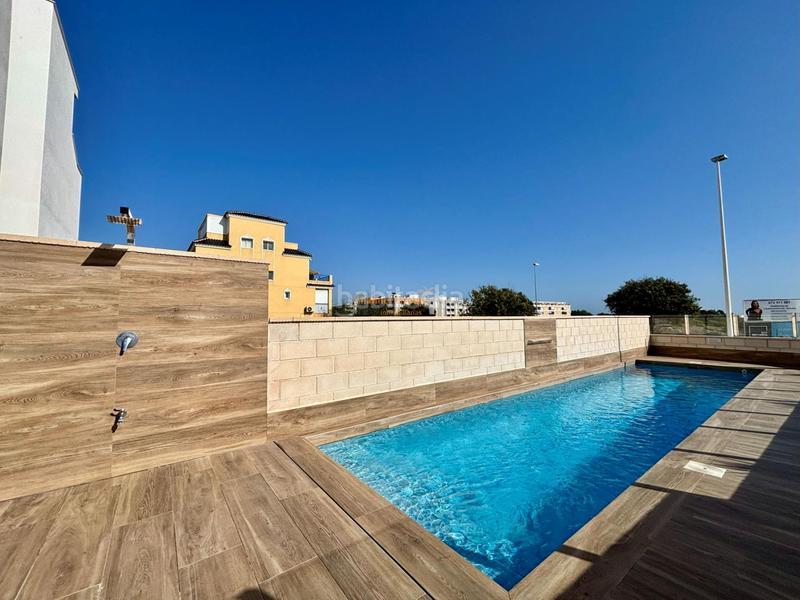 Foto 9f18da24-4316-49e9-bd8e-1a66da8e7901. Casa a schiera con parcheggio piscina in Los Secanos Guardamar del Segura