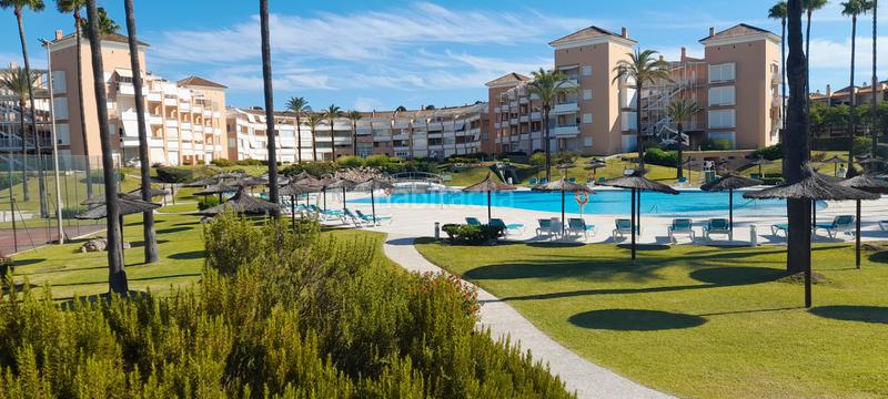 Foto 85742a5f-0d12-4850-b8af-d7a2c8492f4d. Piccolo appartamento con parcheggio piscina in Islantilla costa Islantilla