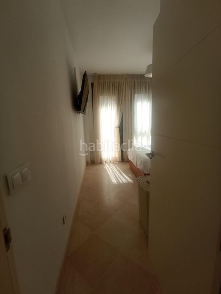 Foto 1933d888-9e50-418c-9e4a-dde2c9d7ff5f. Pis amb xemeneia aparcament a La Buhaira Sevilla