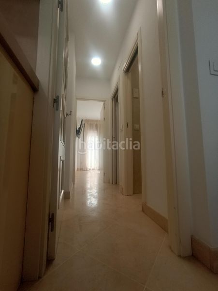 Foto 20107fde-a736-45b5-8725-16dd7d434b7c. Pis amb xemeneia aparcament a La Buhaira Sevilla