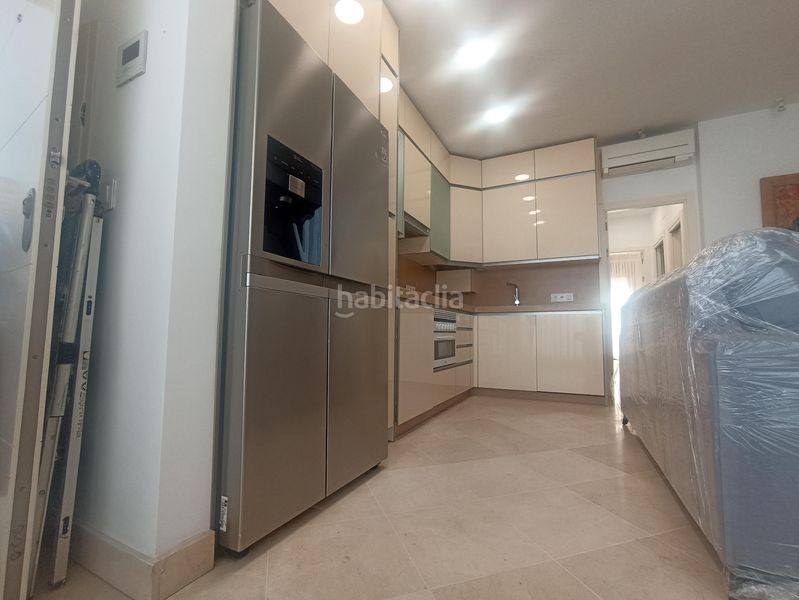 Foto 27baf81f-9339-444c-a34d-71ea33d66dfe. Pis amb xemeneia aparcament a La Buhaira Sevilla