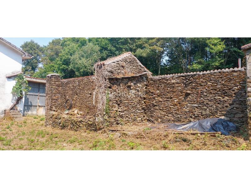 Foto fd5d1439-a5ea-4629-ad40-a0242be23594. Casa con parcheggio in Forcarei