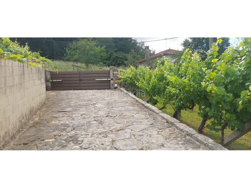 Foto 21a18f93-fafe-4186-a663-723225d985a0. Casa amb aparcament a Silleda