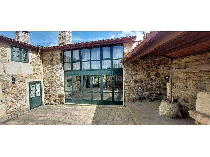 Foto 4d6f2d3f-1b92-46df-be3b-9cb1e53dd4da. Casa amb aparcament a Silleda