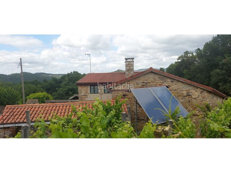 Foto 96b59bbc-b0d1-4f17-b88a-83f1c65e0554. Casa amb aparcament a Silleda