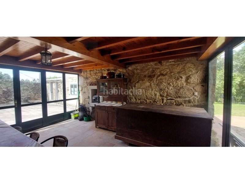 Foto ad8c6531-eced-4b0f-ad5d-c4fe9eec83ba. Casa amb aparcament a Silleda