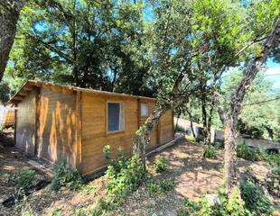 Casa a Riudarenes. Caseta de madera con terreno en venta en riudarenes