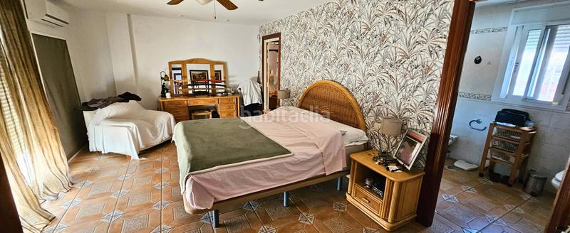 Foto 124bebc8-f5b2-4ac1-a7d4-7fe00ca27da6. Chalet con parcheggio piscina in Capellanía - Retamar Alhaurín de la Torre