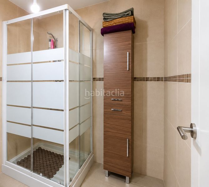 Foto 862407cb-9402-45b9-ae78-383c9ddc60c6. Casa aparellada amb xemeneia aparcament piscina a Málaga