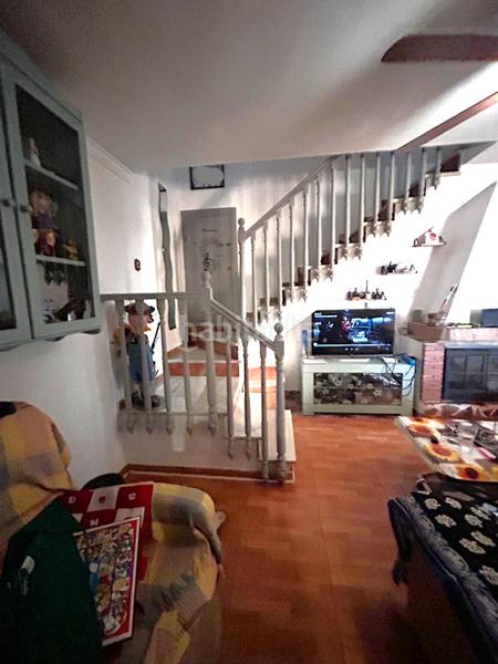 Foto 13961f24-a07c-4362-bc05-f94fabdd26f0. Reihenhaus mit kamin in Coín