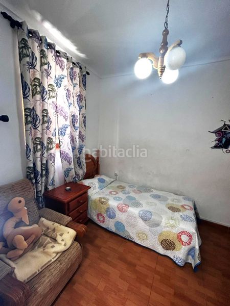 Foto 08ec1ebd-b9a9-4498-a933-1cac42c97ec9. Casa adossada a Coín