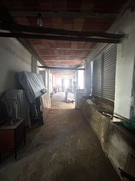 Foto 33724308-c1f6-4fe5-b082-d4eacd52a1b8. Casa adossada a Coín