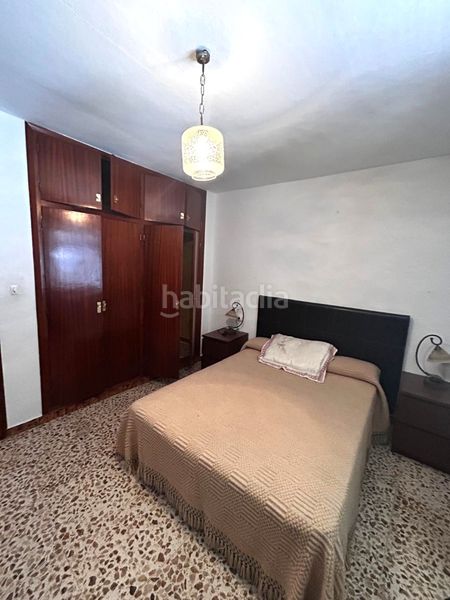 Foto 3a86d20d-ed8e-41fc-a019-bef28d794eb6. Casa adossada a Coín