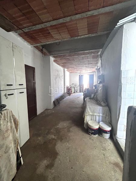 Foto a0bd005b-d3d4-4784-9ad8-a214f1d1e888. Casa adossada a Coín