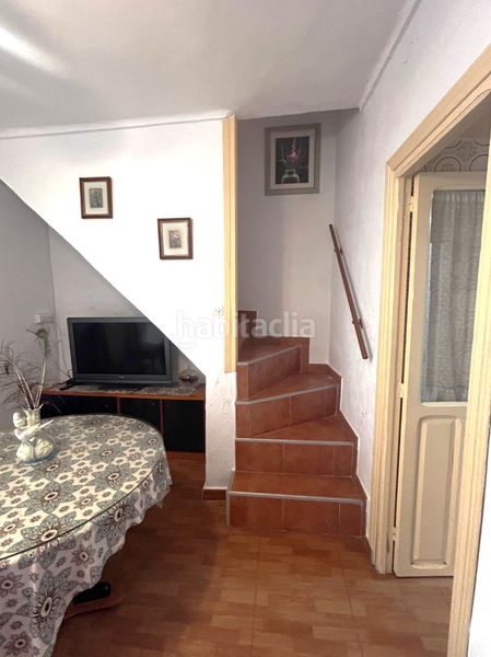 Foto e2fc6232-cb85-407b-847e-9e76132762bb. Casa adossada a Coín