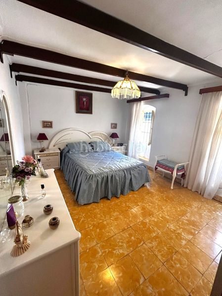 Foto eb268605-1f6f-4d8e-a9c9-62e24fe6ba33. Casa adossada a Coín