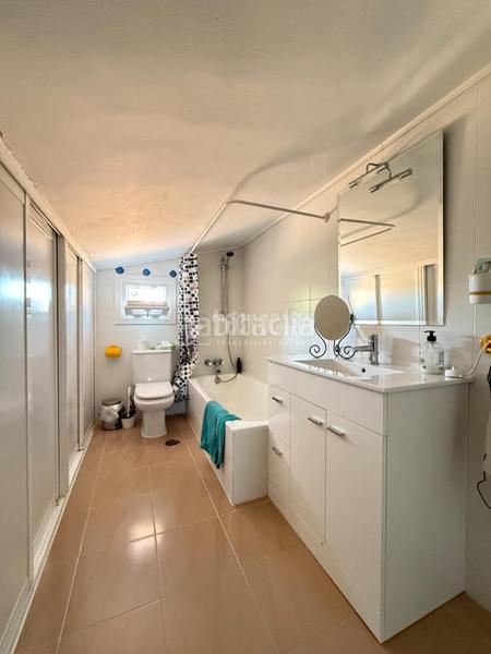 Foto d4f39bcc-a88c-4ee6-bd7f-12e029a090fc. Casa a Parque Coimbra Móstoles