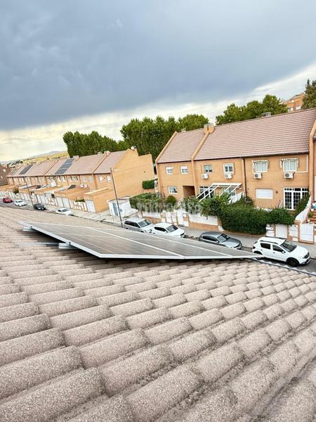 Foto 8729e6b0-afe4-4494-80aa-3e7f27c35837. Casa bifamiliare con riscaldamento parcheggio in Parque Coimbra Móstoles