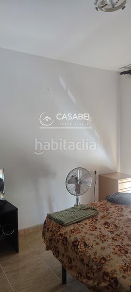 Foto f059ccd6-f990-4d44-8b1f-215b396a5aff. Casa amb aparcament a Palma del Río
