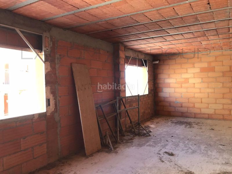 Foto 71471d63-fd3c-45e0-929a-3499cd558548. Casa adossada amb aparcament a Rosselló