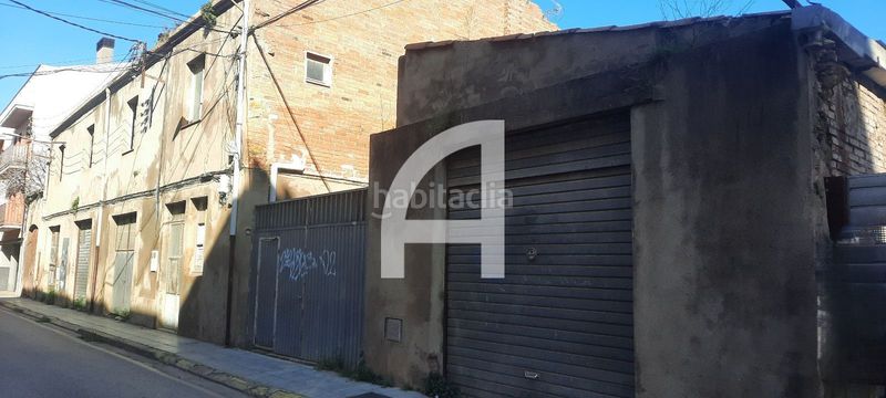 Foto f8e1b087-41e9-4344-9fad-eb208ad35b41. Edifici a Bisbal d´Empordà (La)