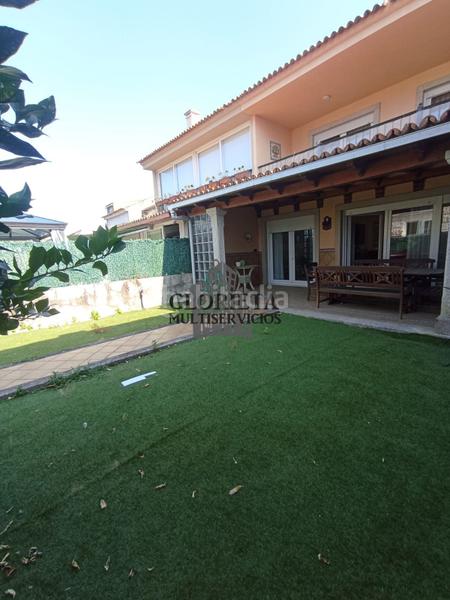 Foto 42638c2a-e2fd-48f5-81de-61a5b8147668. Maison jumelée avec chauffage parking dans Baiona