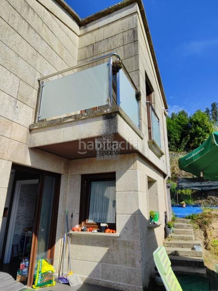Foto abfcaa93-21d6-4b1f-8e27-f6428fdde5a5. Maison avec chauffage parking dans Bueu