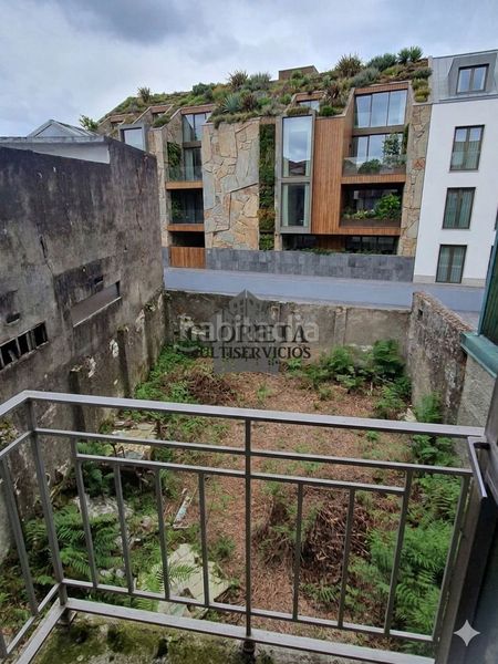 Foto 1bf348cc-aa3f-456e-9e2b-c061ce079b50. Casa adossada amb calefacció a As Travesas - Balaidos Vigo