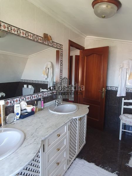 Foto 948f95d3-d062-47fe-9a13-bf026ee8b66a. Casa amb calefacció aparcament a Coruxo - Oia - Saiáns Vigo