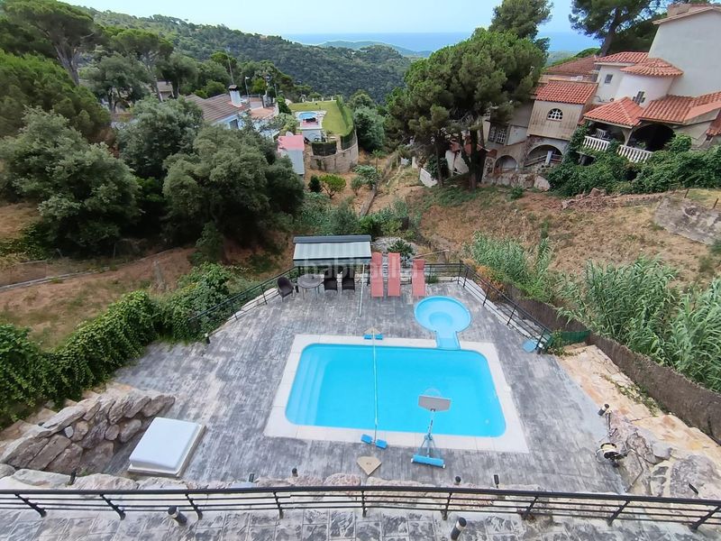 Foto c4ffc522-96f9-41d1-9c25-31553c5fa699. Casa amb calefacció aparcament piscina a Sant Cebrià de Vallalta