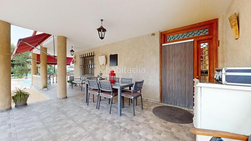 Foto b3a57886-57c9-4c9a-bde9-61669cf7876f. Chalet peña las aguilas chalet con 4 dormitorios, piscina y barbacoa exterior en Elche / Elx