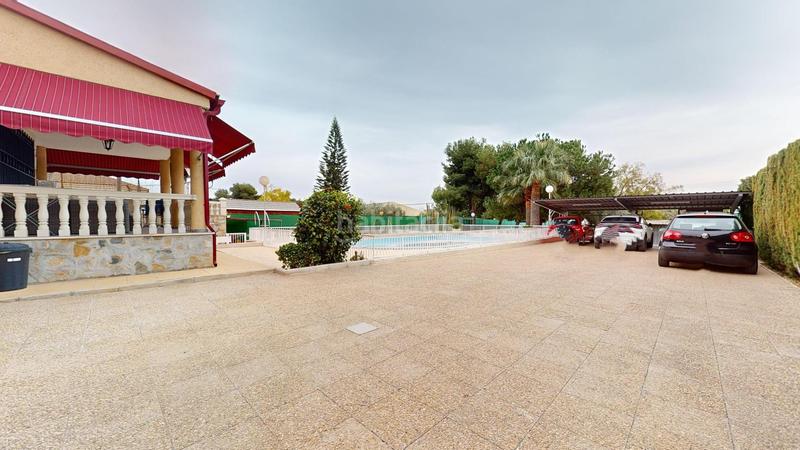 Foto fda4ece4-d4bc-453a-8d5c-2e7982413069. Chalet peña las aguilas chalet con 4 dormitorios, piscina y barbacoa exterior en Elche / Elx