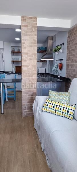Foto 2572cfc8-757f-4b7f-a3ad-36fe26ce70de. Piso en toldilla espectacular oferta para vivir o veranear junto al mar planta baja de diseño moderno y actual con terraza, a tan solo 50 metros en Valencia