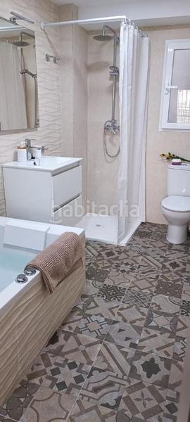 Foto 5c111107-3666-41c0-8e45-91cb75f0e3a6. Piso en toldilla espectacular oferta para vivir o veranear junto al mar planta baja de diseño moderno y actual con terraza, a tan solo 50 metros en Valencia
