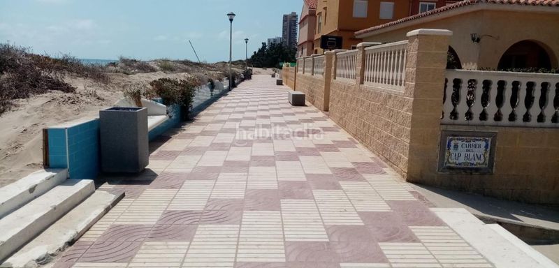 Foto 7b89626e-459c-4ed6-a791-7ccf8e930eac. Casa adossada a calle calle cap de canet a Mareny de Barraquetes Sueca