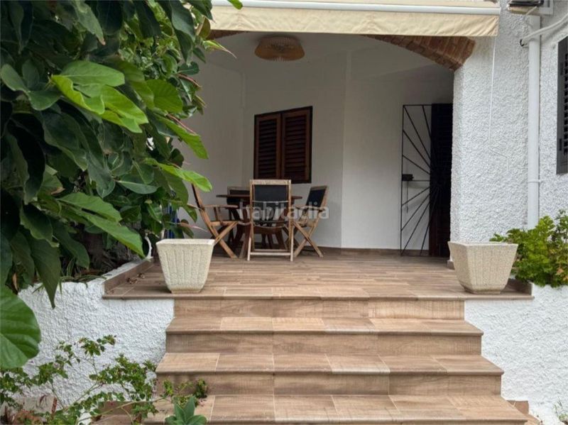 Foto 9302378e-4151-4f49-b8a9-4994f5c8b2dc. Casa adossada a calle calle cap de canet a Mareny de Barraquetes Sueca