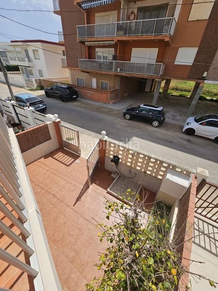 Foto 21c9540c-4586-4eb3-b78c-917d82e68259. Casa adossada a calle calle cala de calp a Les Palmeres Sueca