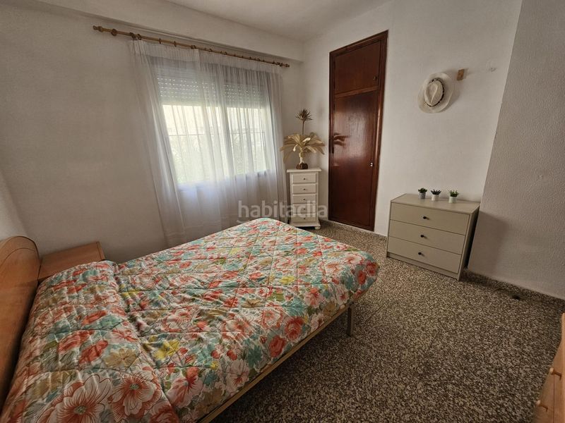 Foto 6e747428-fdf8-4856-99bc-51d17ce715db. Casa adossada a calle calle cala de calp a Les Palmeres Sueca