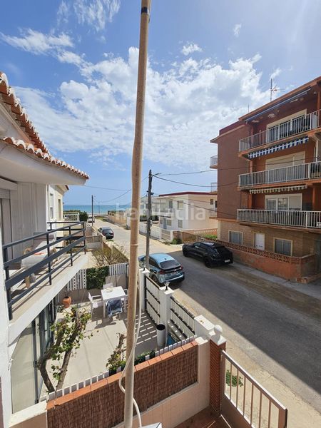 Foto a09a336c-33ab-47d9-ae1f-7f4d5c975fc0. Casa adossada a calle calle cala de calp a Les Palmeres Sueca