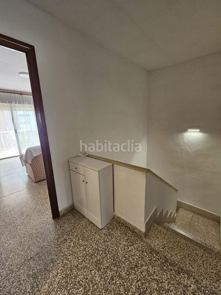 Foto b86e65b5-ba87-47c6-9171-66186d3da2f2. Casa adossada a calle calle cala de calp a Les Palmeres Sueca