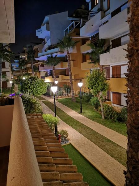 Foto 43b89338-921a-42e7-bd7f-439a1f426c44. Lloguer pis amb aparcament piscina a Punta Prima Orihuela