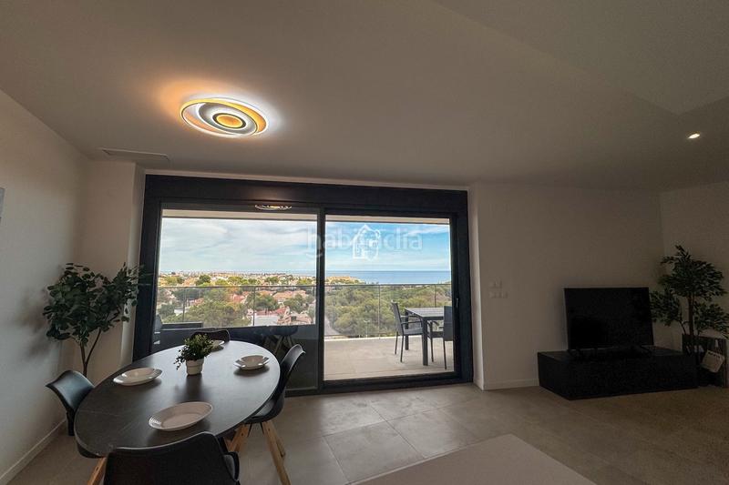 Foto cc783237-7dc1-4962-8add-9a850fd83223. Rent flat with parking pool in Campoamor Orihuela