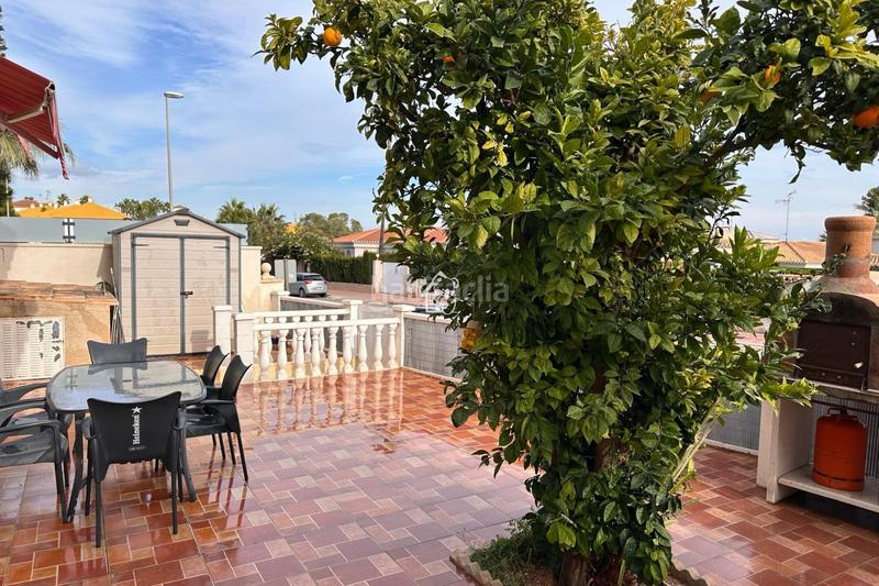 Foto 16d46cf7-bc77-4e6b-ad76-d6dc008abd04. Affitto casa a schiera con parcheggio piscina in Playa Flamenca Orihuela