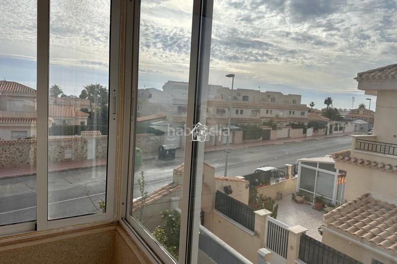 Foto 6703210f-ed8e-4be3-99a5-3246bca1a990. Rent semi detached house with parking pool in Playa Flamenca Orihuela