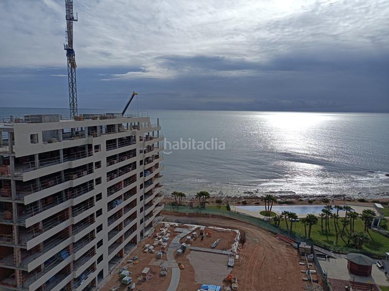 Foto 7f70f6f3-48f0-4d26-a3e1-6f471f468b07. Piso impresionante piso en venta en Punta Prima en Torrevieja