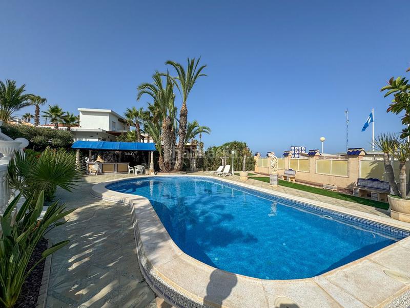 Foto 06b773ab-0e90-476b-beca-067a3d1dbcba. Alquiler chalet villa de lujo en primera linea en cala capitan en Orihuela