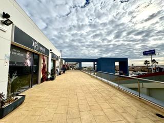 Lloguer Local Comercial a La Zenia. Local en bruto para alquiler en centro comercial los dolses