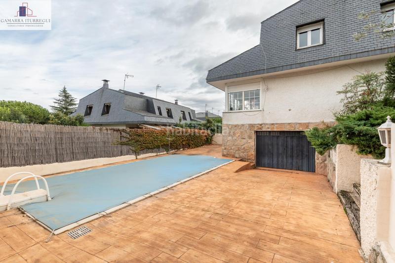 Foto 0138fff0-6b1f-4f88-8857-9e5c425caa8e. Doppelhaus mit heizung parking pool in Las Vegas-El Pozanco-Adelfillas Colmenar Viejo