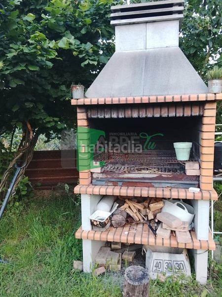Foto fcf74087-946c-4b38-ae12-63b5f79b8c26. Casa amb calefacció aparcament a Leiro